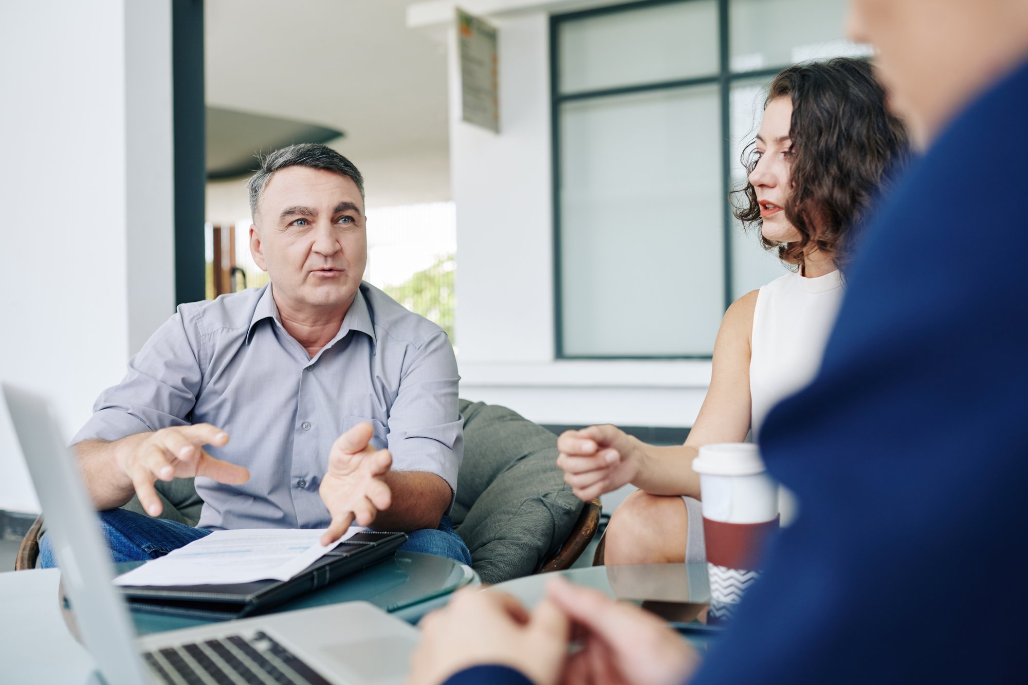 Entrepreneur_Talking_To_Team_original_1075436